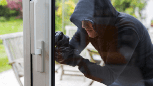 Burglar trying to open the door