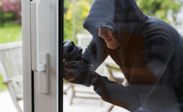 Burglar trying to open the door