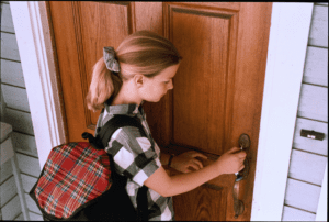A girl opening the door